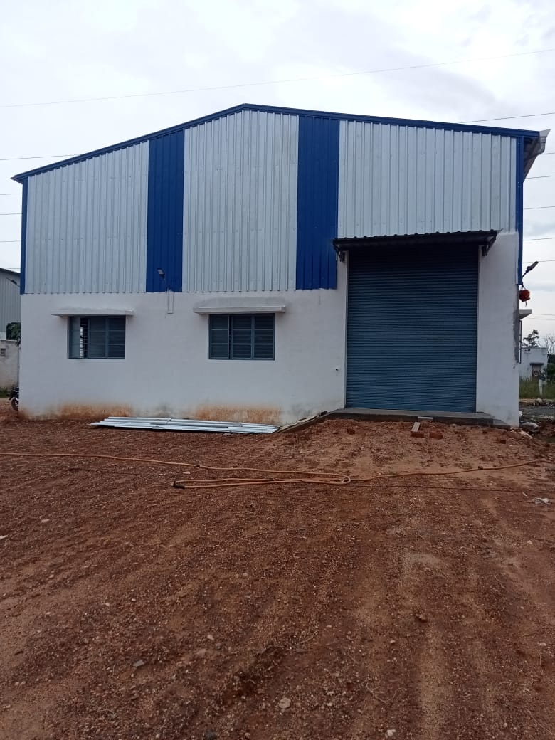 Vedanth factory building front with shutter door